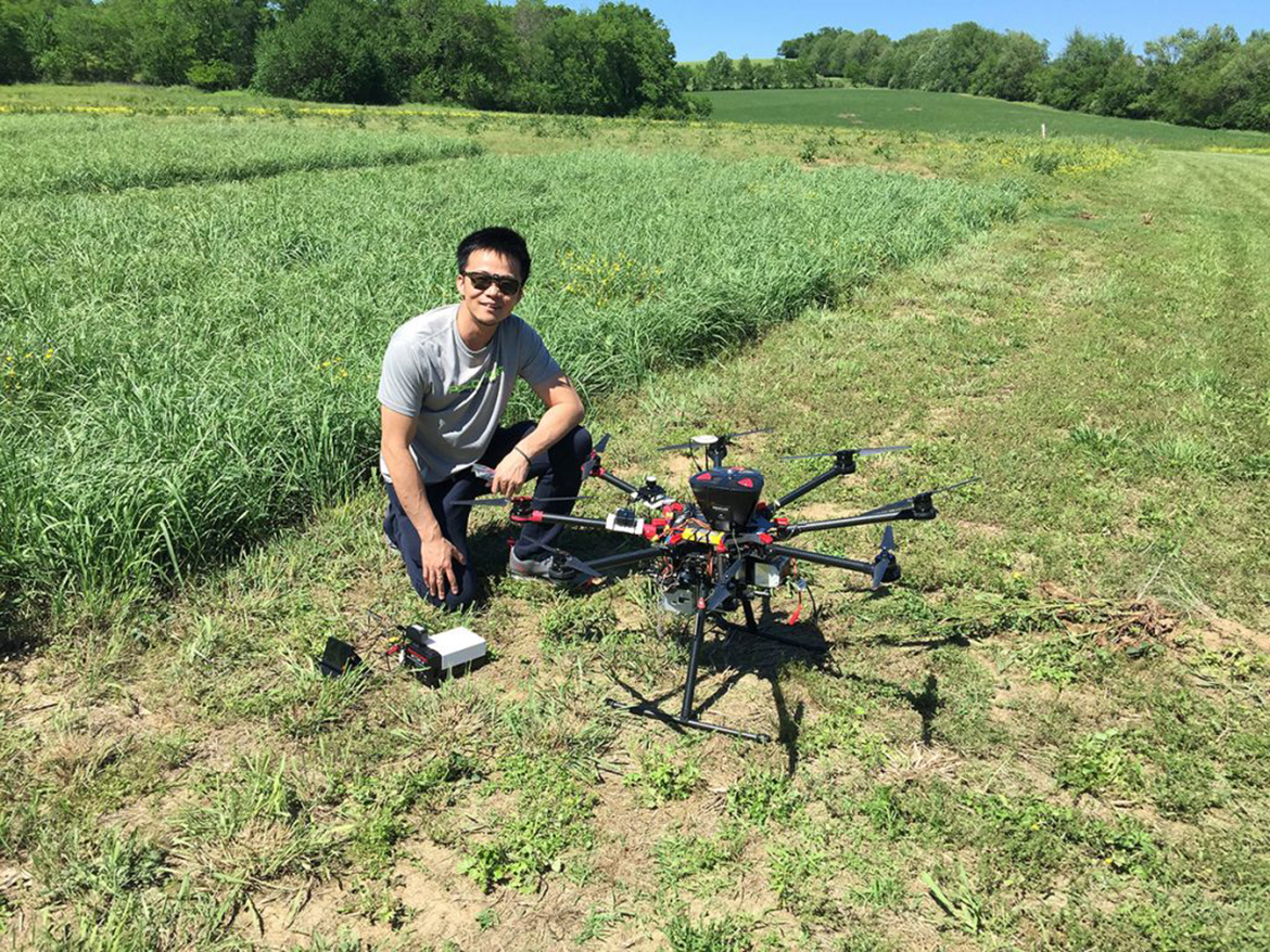 MTSU School of Agriculture associate professor Song Cui uses a DJI S-1000-plus drone and multispectral camera to monitor bioenergy crop production (switchgrass) at the MTSU Farm in Lascassas, Tenn. Cui leads a team that landed a three-year, $750,000 USDA grant to establish the Tennessee Digital Agriculture Center at MTSU to enhance youth education. Cui will be one of the presenters Wednesday, March 15, at the first Food Systems Hybrid Field Day at MTSU. (Submitted file photo)