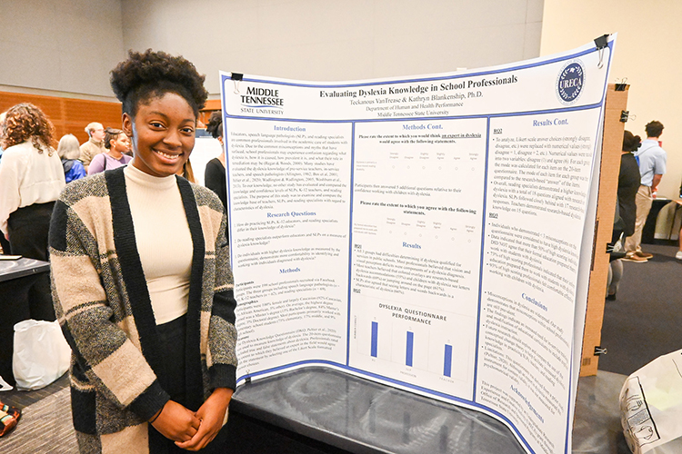 Tecka VanTrease, Middle Tennessee State University speech-language pathology and audiology senior, presented her research on professionals and misconceptions about people with dyslexia at MTSU’s 17th annual Scholars Week student research and creative activity exposition on March 24, 2023, in the Student Union ballroom on campus. (MTSU photo by Stephanie Wagner)