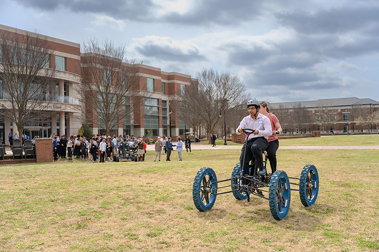 Middle Tennessee State University students demonstrate their vehicle creation to a crowd as part of MTSU’s 17th annual Scholars Week student research and creative activity exposition on March 24, 2023, outside of the Student Union Building on campus. (MTSU photo by J. Intintoli)