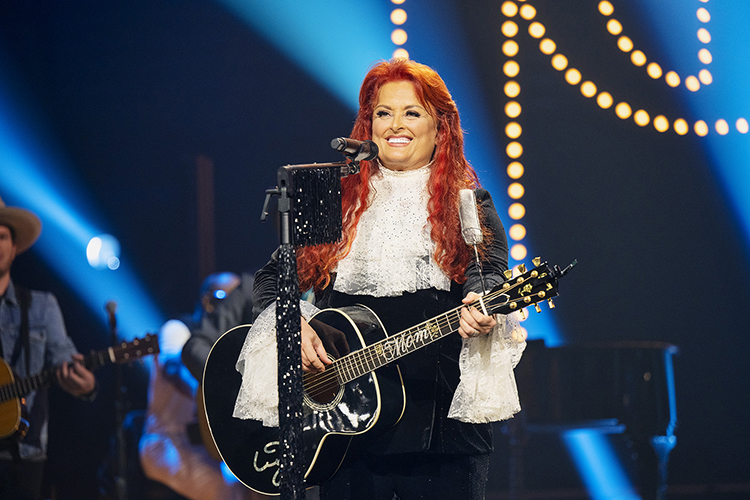 Wynonna Judd performs at “The Judds: Love is Alive – The Final Concert” on Nov. 3, 2022, at the Murphy Center on the Middle Tennessee State University campus. MTSU students, faculty and alumni worked on nearly every aspect of a special red carpet event as well as the made-for-TV concert set to air Saturday, April 29, on CMT. (MTSU file photo by James Cessna)