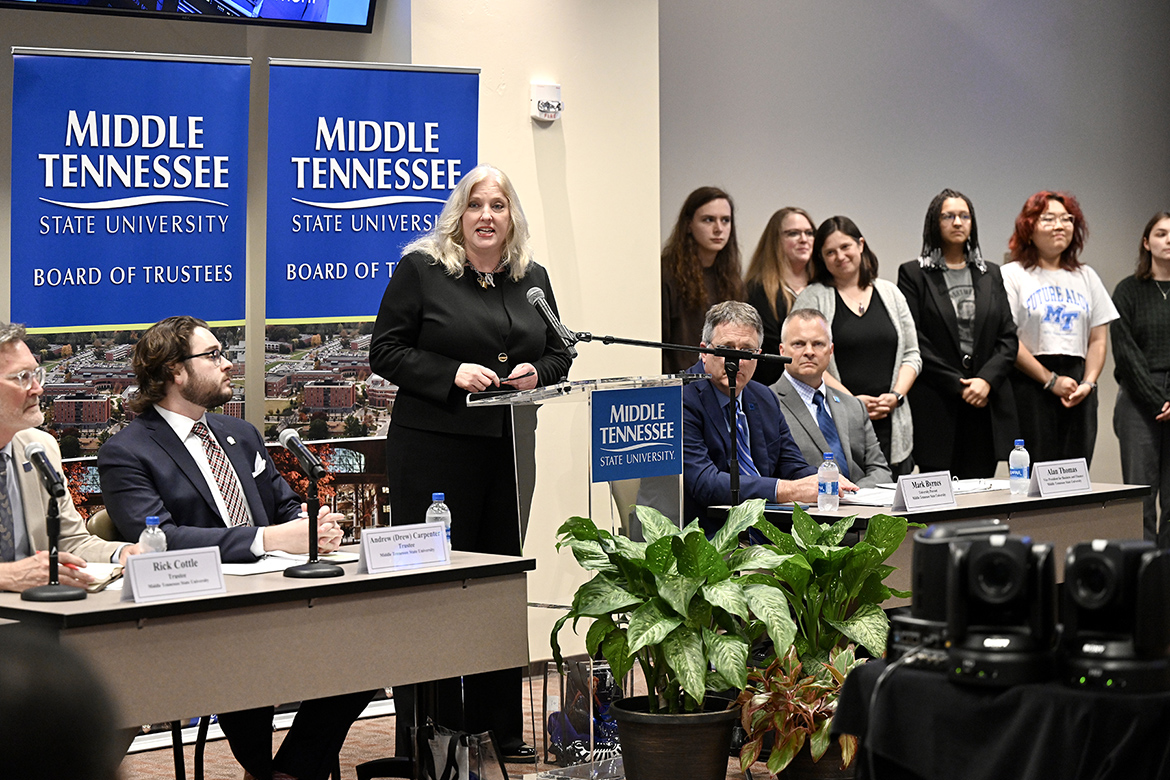 Beverly Keel, dean of the College of Media and Entertainment at Middle Tennessee State University, discusses the successful recruitment and retention strategies implemented by the college at the MTSU Board of Trustees quarterly meeting Tuesday, April 4, 2023, in the Miller Education Center on Bell Street in Murfreesboro, Tenn. Standing, back right, are students and faculty members from the college. (MTSU photo by J. Intintoli)