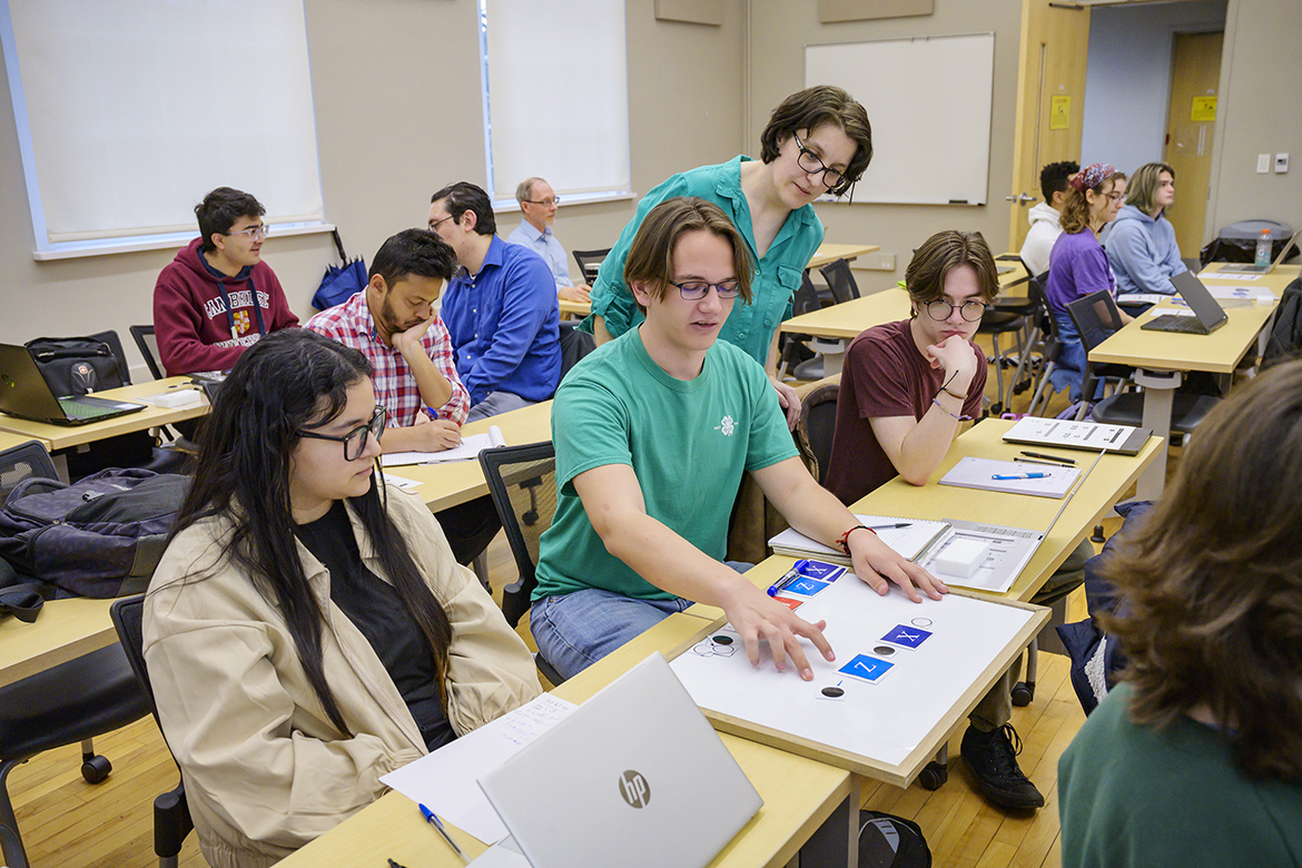 Middle Tennessee State University Physics and Astronomy Department associate professor and computational quantum physics expert Hanna Terletska oversees her Introduction to Quantum Computing class earlier this semester. The students take part in a matching task activity involving single qubit gates. (MTSU photo by Andy Heidt)
