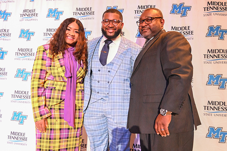 Michai Mosby, center, was recently elected president of the Student Government Association at Middle Tennessee State University. Before his official swearing in on Monday, April 24, he posed for photos with his parents, Jocelyn Mosby, left, and Marcus Mosby, during the Student Government Association awards banquet at the Student Union Building on campus. (MTSU photo by Stephanie Wagner)