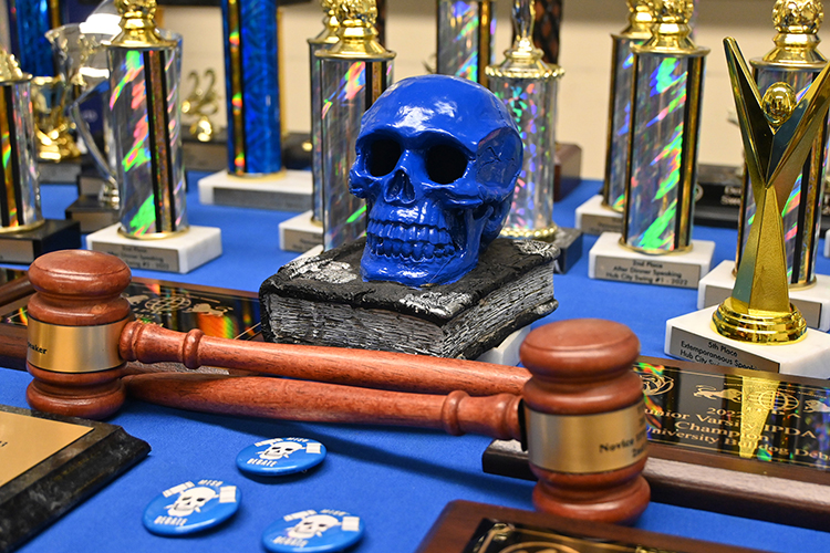 The Blue Raider Debate Team’s blue skull symbol is pictured amid a host of individual and team awards captured during the 2022-23 season and stored inside Jones Hall on the Middle Tennessee State University campus. (MTSU photo by Jimmy Hart)