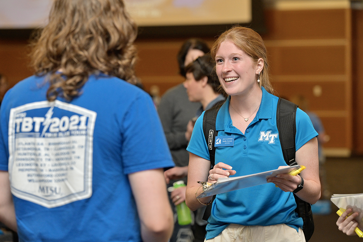 Middle Tennessee State University Student Orientation Assistant Emily Groves answers questions from an incoming freshman May 16 in the Student Union Ballroom. SOAs play a vital role in assisting with CUSTOMS orientation for new students. (MTSU photo by Andy Heidt)