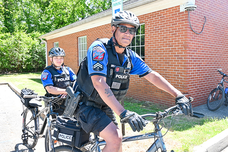 Master Patrol Officer Leroy Carter, right, of Middle Tennessee State University’s Police Department and MTSU officer Jad Dishner, left, take pause from a recent bicycle patrol training session on campus. Dishner will be one of 15 to 16 MTSU officers to get certified in the next few months. Carter will instruct three bike patrol training classes this May and June for MTSU Police officers and extended to officers from surrounding departments, including the Rutherford County Sheriff’s Office, Murfreesboro Police Department and Goodlettsville Police Department. (MTSU photo by Stephanie Wagner)