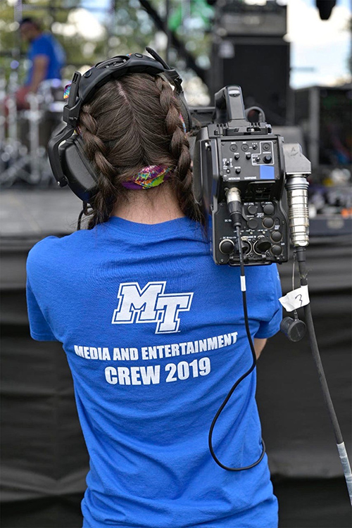 Pictured in this 2019 photo at the Bonnaroo Music and Arts Festival in Manchester, Tenn., Middle Tennessee State University alumna Brea Robbins (Class of 2021), a freelance tour video director and engineer, says her real-world experience working at Bonnaroo was instrumental in shaping her career path. She has engineered for Motley Crue, Def Leppard, Poison, Post Malone, NCT Dream and Zach Bryan and directed for Joan Jett and The Judds. (Submitted photo)