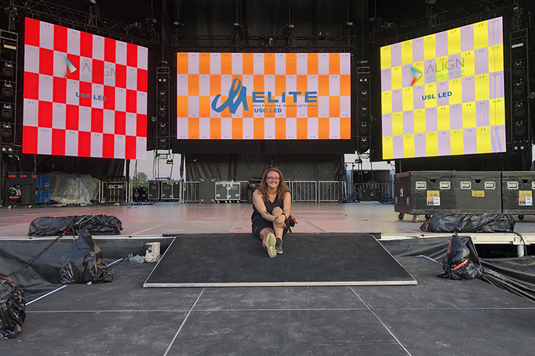 Pictured in this undated photo, Middle Tennessee State University alumna Erin Moore (Class of 2018) says her real-world experience working at the Bonnaroo Music and Arts Festival in Manchester, Tenn., was instrumental in shaping her career path. Moore has worked on tours for Fall Out Boy, Luke Bryan, Dustin Lynch and John Pardi. As production coordinator for High End TV, she now does video work for clients such as Amazon, Google, Disney+ and Netflix. (Submitted photo)