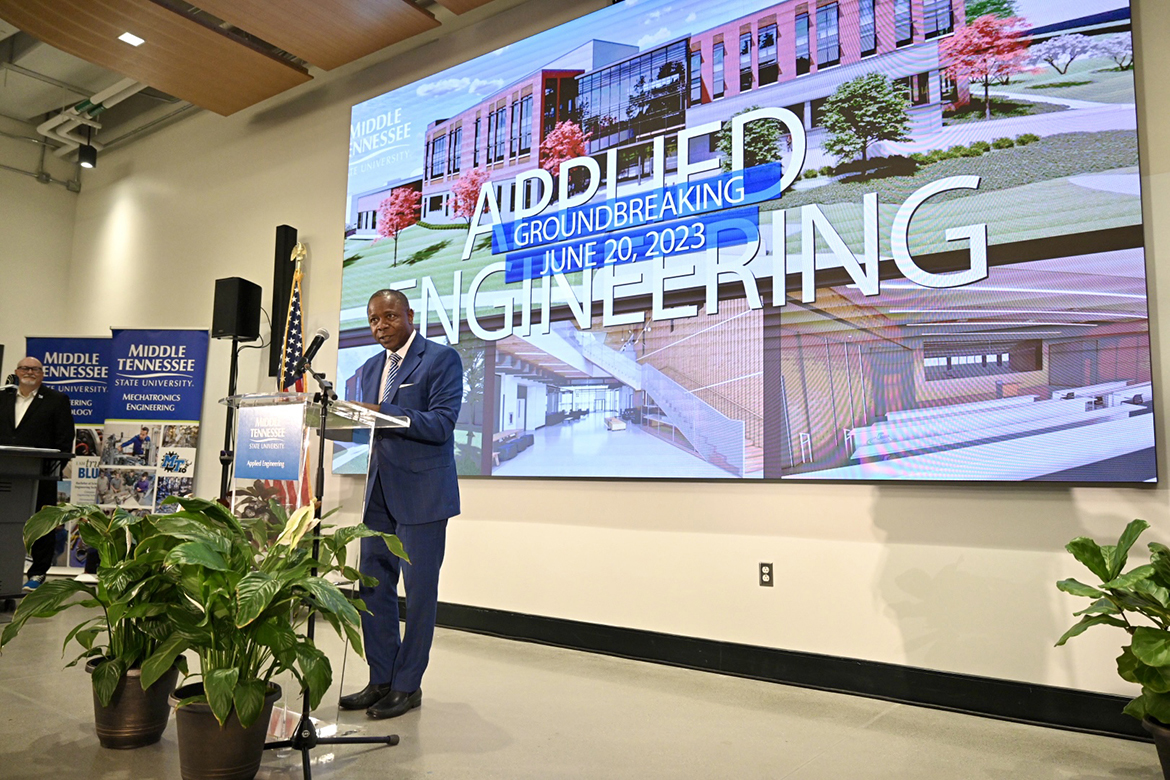 new Applied Engineering Building, to be completed by summer or fall of 2025 on the east side of campus at Blue Raider and Alumni drives. Because of rain, the ceremony took place in a large School of Concrete and Construction Management Building classroom on Tuesday, June 20. (MTSU photo by J. Intintoli)