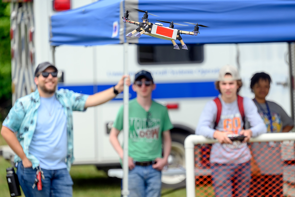 High school students attending the recent Middle Tennessee State University Digital Agriculture Camp at the MTSU Farm in Lascassas, Tenn., take turns flying small drones during the second week of the nearly three-week event where they also learned about precision agriculture and data science. (MTSU photo by J. Intintoli)