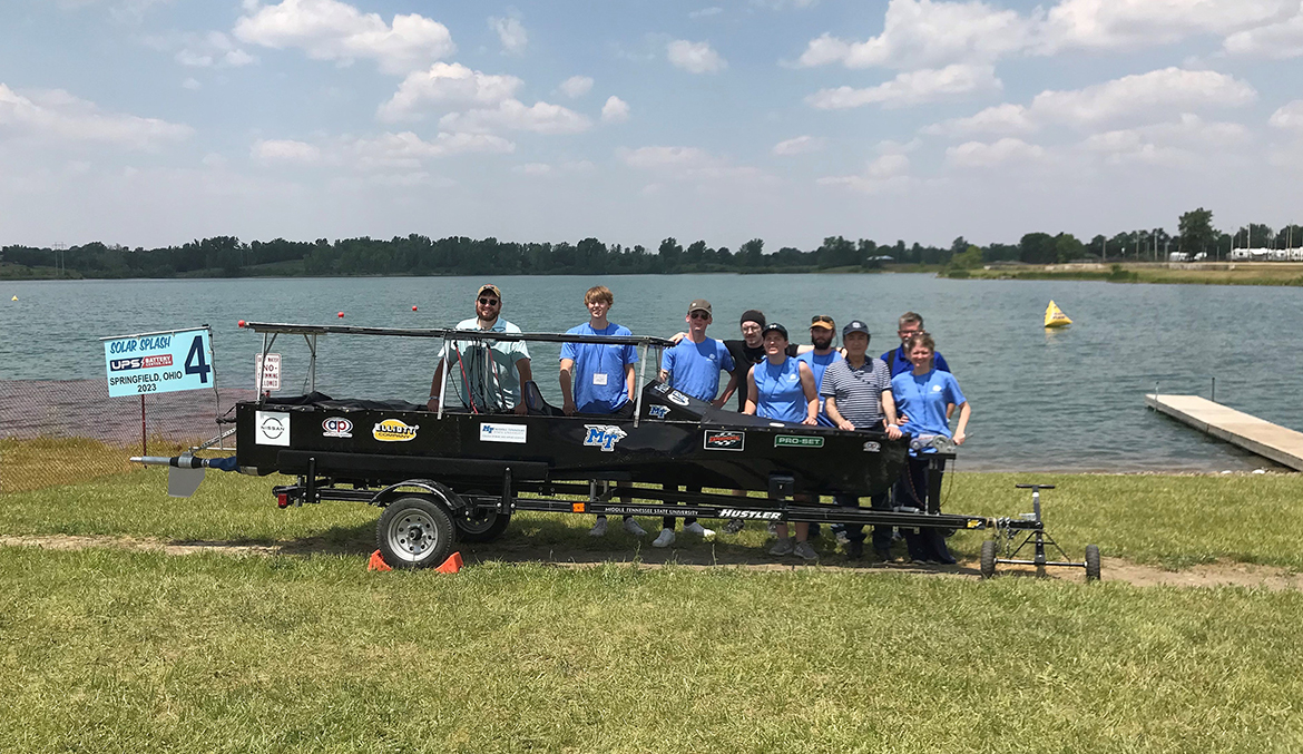 Members of the Middle Tennessee State University solar boat team gather with their boat during the recent international Solar Splash competition in Springfield, Ohio. The team placed fourth overall for the second consecutive year and earned two special awards. (Submitted photo)
