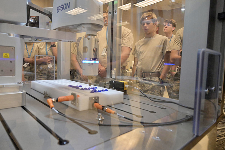 Civil Air Patrol cadets attending the weeklong National Cadet Engineering Technology Academy, also known as E-Tech, observe a machine demonstration Tuesday, July 11, inside a lab in the Voorhees Engineering Technology Building on the campus of Middle Tennessee State University. (MTSU photo by Andy Heidt)