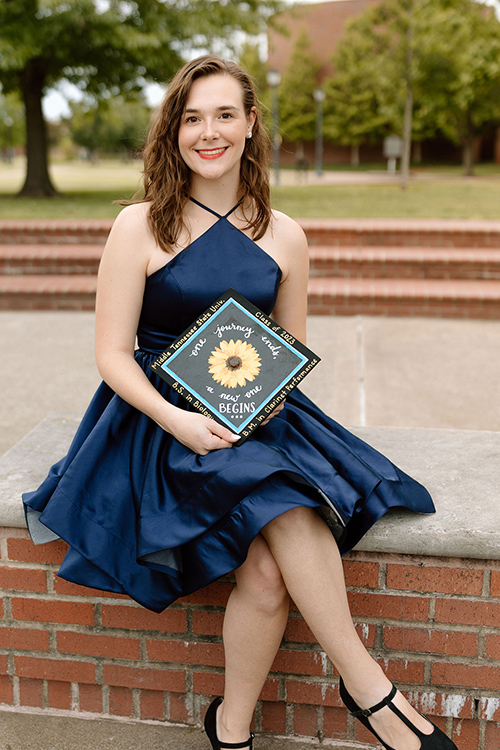 In this spring 2023 photo, Catheryn Bolick, a spring Middle Tennessee State University Honors College graduate from Smyrna, Tenn., holds her graduation mortarboard that reads “one journey ends, a new one begins.” Bolick is one of 62 recipients nationwide to receive Phi Kappa Phi Fellowship for 2023 and will pursue a doctorate in cancer cell biology at Washington University in St. Louis, Mo. (Submitted photo)
