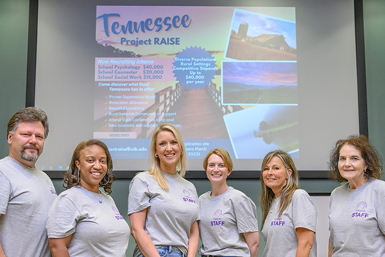 Tiffany Wilson, second from left, professional school counseling coordinator for Middle Tennessee State University, takes a photo with leadership from Project RAISE, at MTSU’s College of Education building on July 20, 2023. Also pictured, from left, are Ron Robertson, school psychology content expert; Wilson; April Ebbinger, director of psychological and behavioral supports for the Tennessee Department of Education; Elizabeth O’Brien, school psychology content expert; Lisa Crawford, Project RAISE director; and Connie White, Project RAISE coordinator. Wilson serves as a consultant for the Tennessee Department of Education’s $14 million grant project to retain and recruit mental health professionals into high-needs, rural school districts across the state. (MTSU photo by J. Intintoli)
