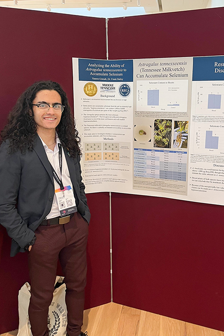 Yaseen Ginnab, undergraduate researcher from Middle Tennessee State University, presents his project about a native Tennessee plant at the World Congress on Undergraduate Research at the University of Warwick in Coventry, England, this spring. (Submitted photo)
