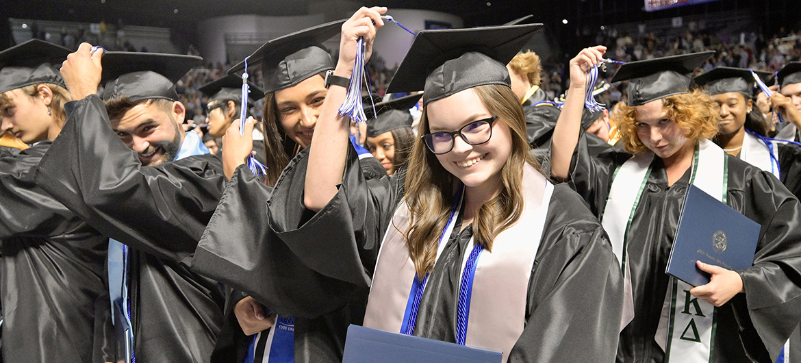 A group of proud spring 2023 Middle Tennessee State University graduates relocate their tassels to signal their accomplishment during the May 5 ceremony in Hale Arena inside Murphy Center. The summer 2023 commencement is set for 9 a.m. Saturday, Aug. 12, at Murphy Center. (MTSU file photo by Andy Heidt)