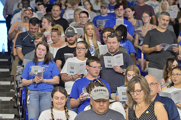 New Middle Tennessee State University students and their parents and family members recite the True Blue Pledge during University Convocation in Murphy Center Saturday, Aug. 26. More than 3,000 people attended the 22nd annual ceremony. (MTSU photo by Andy Heidt)
