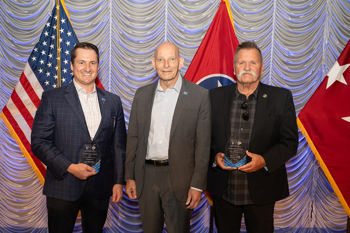 MTSU alumnus Jay Strobino (Veteran Leader Award), left, and David Corlew (Veteran Community Partner Award), right, received the major awards presented during the sixth annual Middle Tennessee State University Veteran Impact Celebration fundraiser Friday, Aug. 25, in the MTSU Student Union Ballroom. They are shown with Keith M. Huber, senior adviser for veterans and leadership initiatives and retired U.S. Army lieutenant general. (MTSU photo by James Cessna)