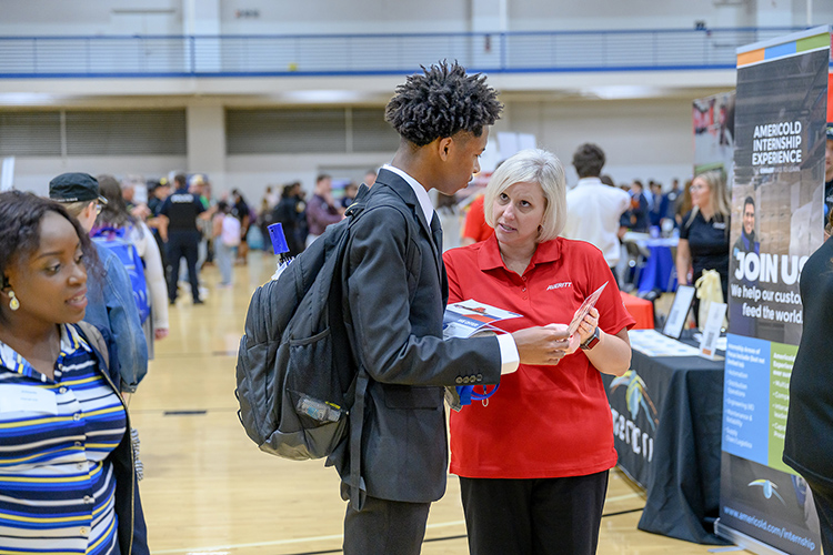 Middle Tennessee State University computer science major Latravieon Walton of Mason, Tenn., talks with Andrea Lancaster, a representative for transportation and logistics company Averitt, on Thursday, Sept. 28, at the 2023 Fall Career Fair inside the Campus Recreation Center. Representatives from almost 180 employers met with 1,000-plus students and alumni at the event, which was hosted by the MTSU Career Development Center. (MTSU photo by J. Intintoli)