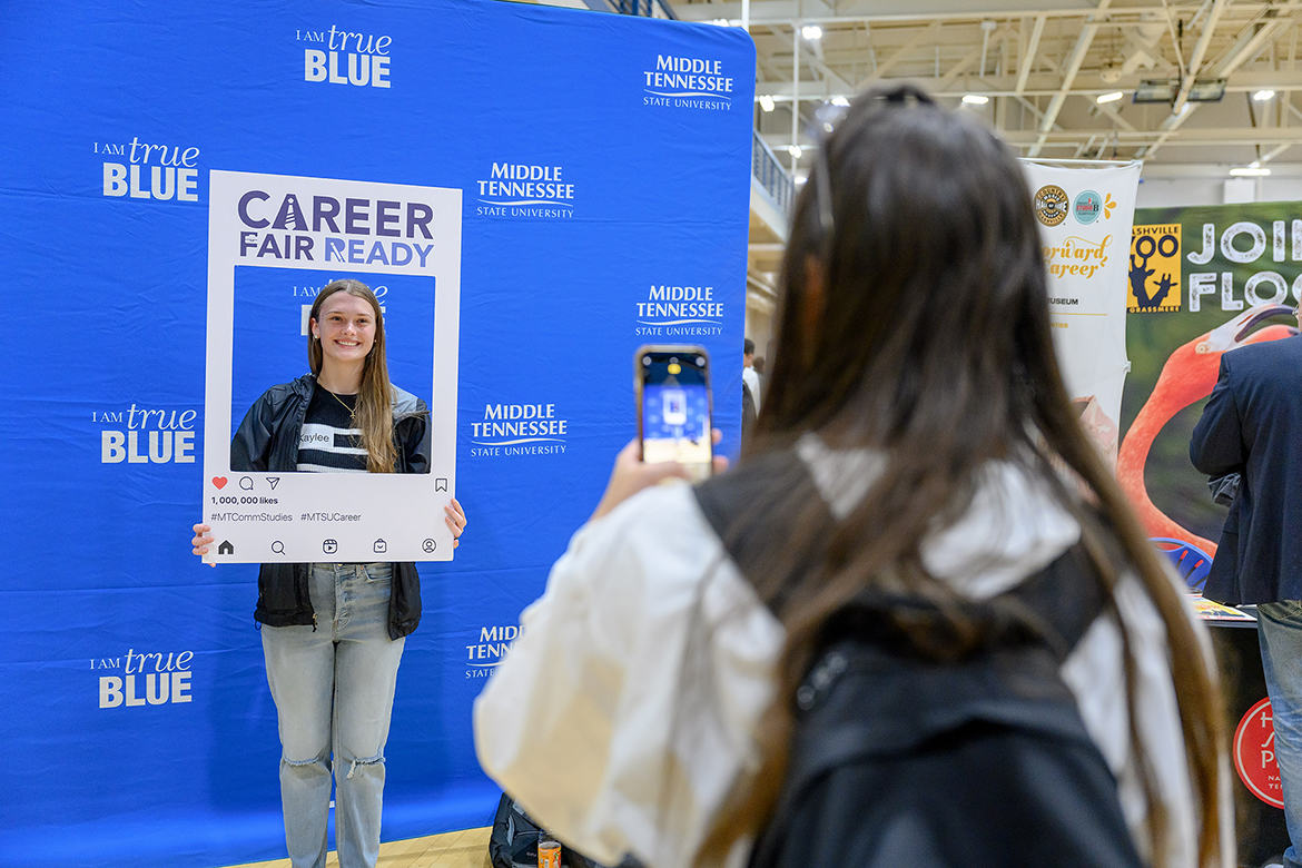 Middle Tennessee State University aerospace major Kaylee Bausman of Jackson, Tenn., poses for a photo with the “Career Fair Ready” frame on hand Thursday, Sept. 28, at the 2023 Fall Career Fair inside the Campus Recreation Center. The MTSU Career Development Center hosted the event, which drew representatives from almost 180 employers and 1,000-plus students and alumni. (MTSU photo by J. Intintoli)