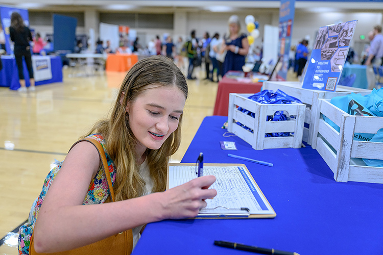 Middle Tennessee State University elementary education major Macy Grubbs of Brentwood, Tenn., signs in Thursday, Sept. 28, at the 2023 Fall Career Fair hosted by the MTSU Career Development Center inside the Campus Recreation Center. Representatives from almost 180 employers networked with the 1,000-plus students and alumni who attended the three-hour event. (MTSU photo by J. Intintoli)