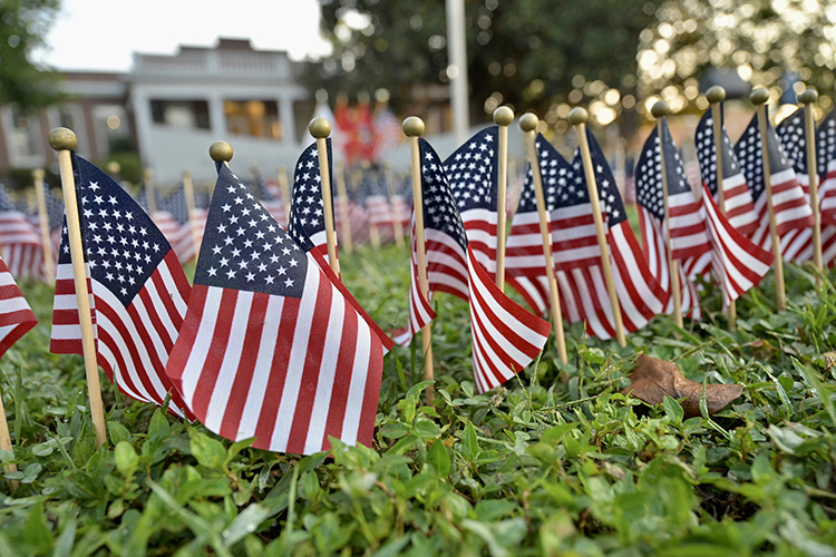 Thousands of tiny American flags representing the victims of the 9/11 terror attacks were planted on the lawn near the Veterans Memorial outside of the Tom H. Jackson Building at Middle Tennessee State University as part of the ninth annual 9/11 Remembrance Ceremony held Monday, Sept. 11. (MTSU photo by Andy Heidt)