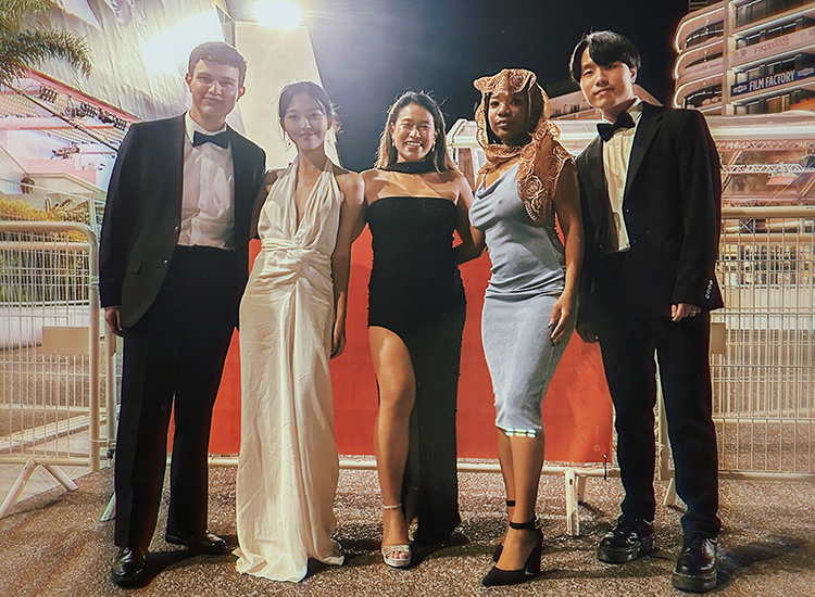 From left, Cannes International Film Festival interns Daniel Jackson, Heidy Lee, MTSU alumna Beatriz Marie Dedicatoria, Shelby Geter and Choi Yun-hyuk (Alex) pose for a photo at Grand Auditorium Louis Lumière on May 26 at the evening premiere of “Cobweb,” a South Korean film that premiered at the festival. (Submitted photo)