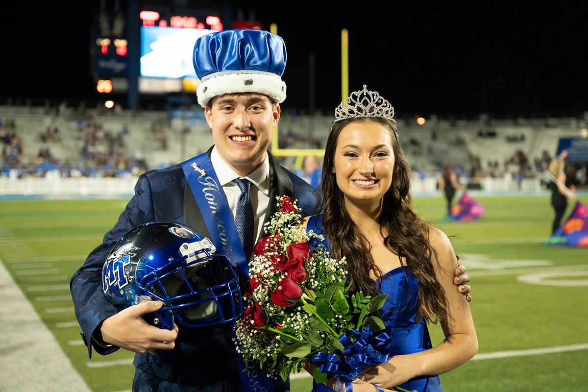 Middle Tennessee State University 2023 Homecoming King and Queen Alexander Hamilton, left, of Falkville, Ala.,  and Lily Beth Woods of Murfreesboro, Tenn., are presented at the 2023 Homecoming game Sept. 23 when the Blue Raiders took on the Colorado State University Rams at Floyd Stadium in Murfreesboro, Tenn. Woods is a senior organizational communication major, while Woods is a senior finance major. (MTSU photo by James Cessna)
