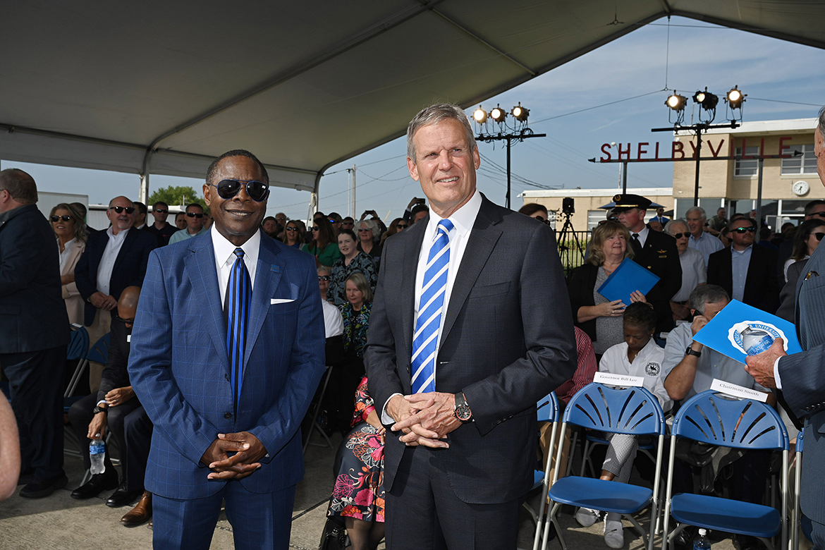 Middle Tennessee State University President Sidney A. McPhee, left, and Tennessee Gov. Bill Lee watch the arrival of several MTSU Diamond Aircraft Thursday, Sept. 21, as the MTSU Department of Aerospace formally announced its move to the Shelbyville Municipal Airport in the coming years. More than 200 people — including alumni, state legislators, students and friends of the university — attended the event at the airport. (MTSU photo by J. Intintoli)