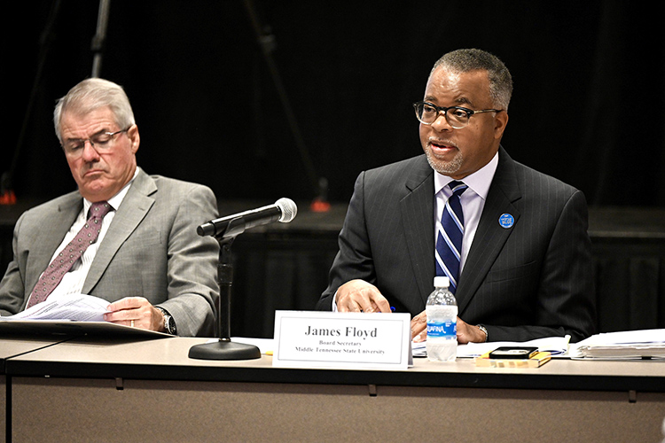 Middle Tennessee State University counsel and Board of Trustees secretary James Floyd, right, answers a question during the board’s quarterly meeting held Tuesday, Sept. 12, at the Miller Education Center on Bell Street. At left is Joe Bales, vice president for university advancement. (MTSU photo by J. Intintoli)