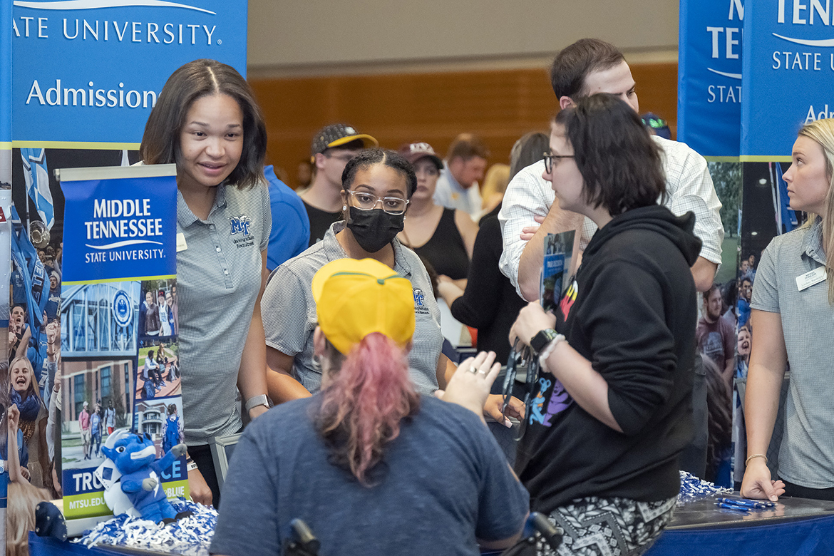 Representatives from the Middle Tennessee State University Admissions Office answer questions and provide information for prospective students and their parents during the September 2022 Rutherford County College Night in the MTSU Student Union Ballroom. Interested students and their parents will return for this year’s college night — featuring about 50 colleges from throughout the South — beginning at 6 p.m. Wednesday, Sept. 6, in the Student Union Ballroom. (MTSU file photo by Cat Curtis Murphy)