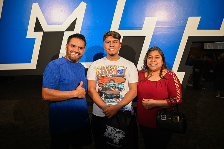 The Sierra family, from left, Osmar Sr., Osmar Jr. and Norma Sierra, smile for a photo at the Middle Tennessee State University True Blue Tour kickoff event Wednesday, Sept. 13, 2023, at the Student Union Building on campus in Murfreesboro, Tenn. (MTSU photo by Stephanie Wagner)