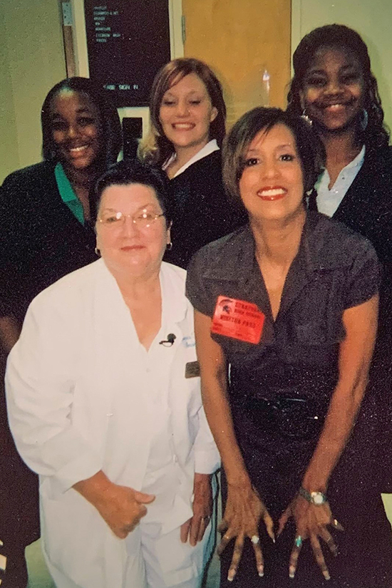 In this undated photo, Hendersonville, Tenn., resident and Nashville teacher Doris Thomas, bottom left, and Vicki Yates, bottom right, former NewsChannel 5 anchor, take a photo with students in Thomas’ classroom at Stratford High School in Nashville, Tenn. Yates interviewed Thomas and some of her students for the station’s “School Patrol” segment. (Submitted photo)