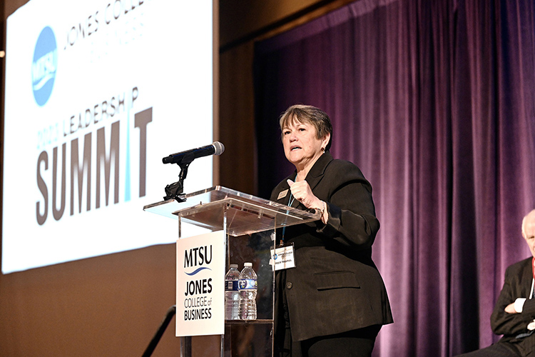 Joyce Heames, dean of the Jones College of Business at Middle Tennessee State University, welcomes the hundreds of attendees to the 2023 Leadership Summit held Friday, Oct. 20, at Embassy Suites in Murfreesboro, Tenn. (MTSU photo by J. Intintoli)