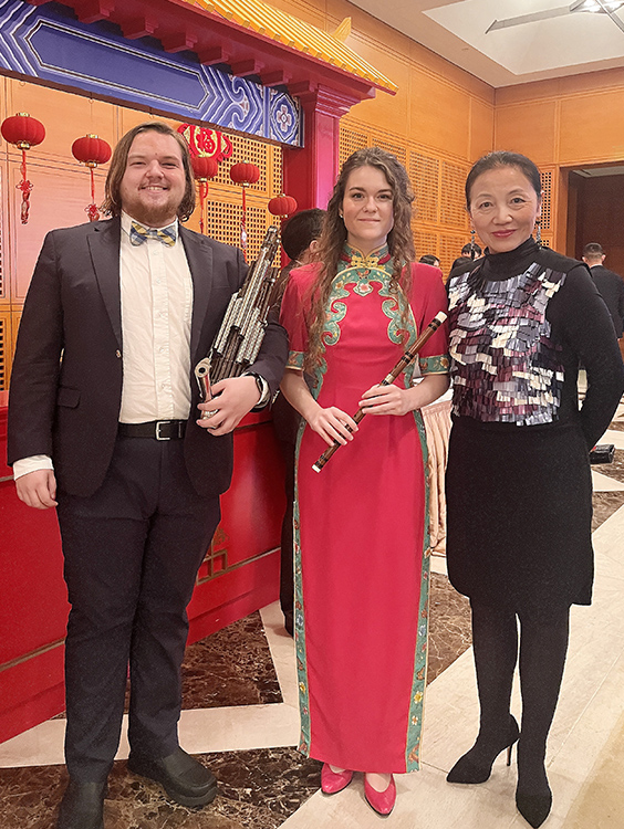 Mei Han, director of the Chinese Music Ensemble and the Center for Chinese Music and Culture at Middle Tennessee State University, stands with ensemble performers Amy Brown, center, and Will Childress, left, after a concert given at the Chinese Embassy in Washington, D.C., on Oct. 17, 2023. (Submitted photo)