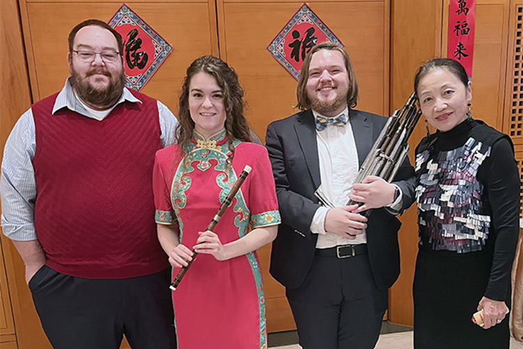 Middle Tennessee State University Vice Provost for International Affairs Robert Summers, far left, stands with MTSU Chinese Music Ensemble performers, second from left, Amy Brown, Will Childress, second from right, and Mei Han, director of the ensemble and the MTSU Center for Chinese Music and Culture, following a concert given at the Chinese Embassy in Washington, D.C., on Oct. 17, 2023. (Submitted photo)