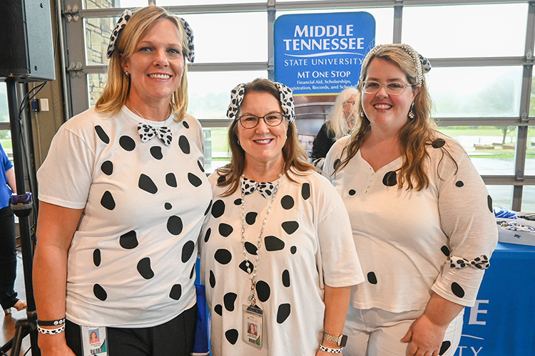 Counselors from Clarksville High School in Clarksville, Tenn., from left, Serena Kerr, Tonya Sherman and Sonja Chilcutt, pose for a photo in costume at the counselor appreciation luncheon as part of Middle Tennessee State University’s True Blue Tour on Thursday, Sept. 28, 2023, at the Wilma Rudolph Event Center in Clarksville, Tenn. (MTSU photo by Stephanie Wagner)