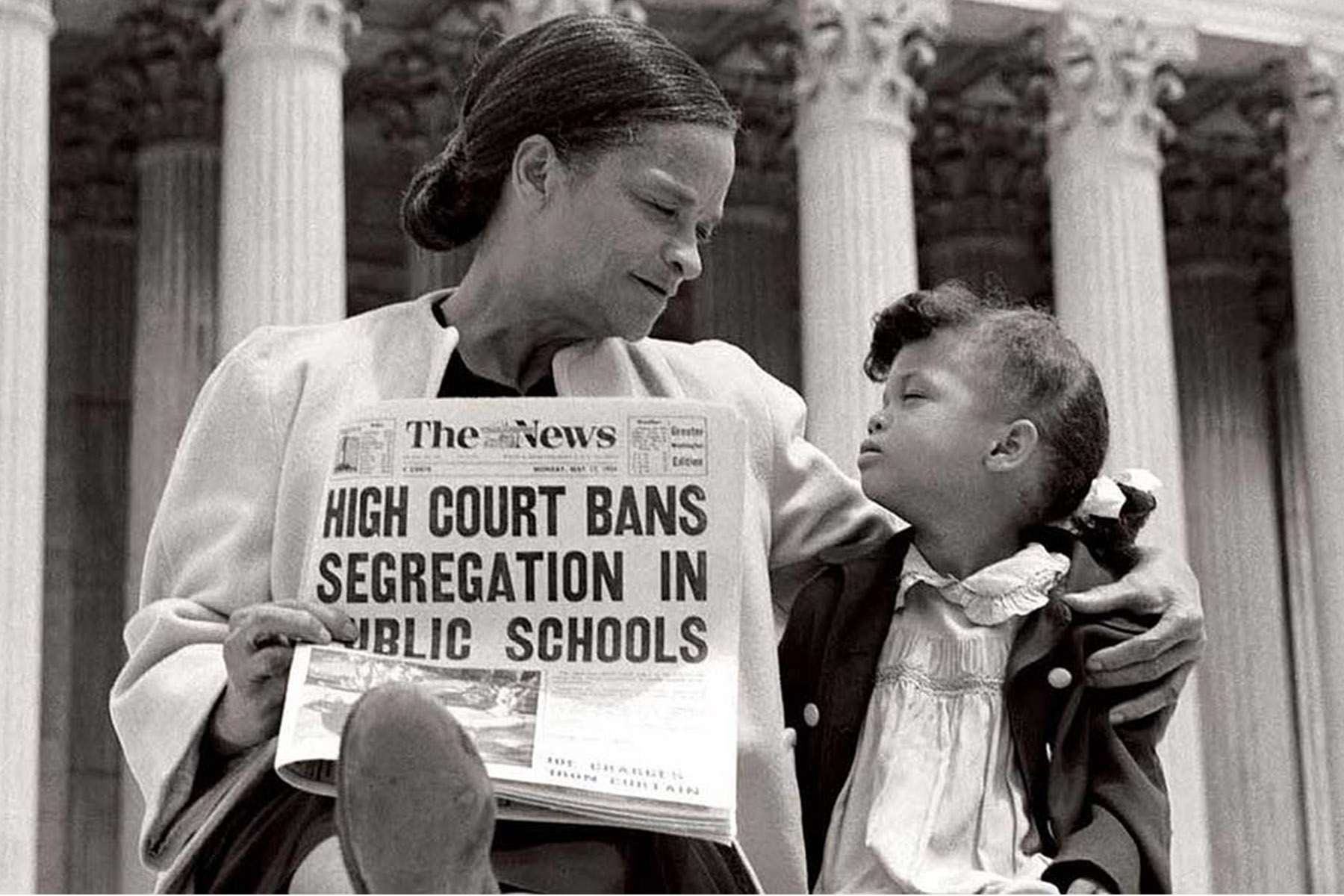 Nettie Hunt and her daughter, Nickie, sit on the U.S. Supreme Court steps on May 18, 1954, following the court's historic Brown v. Board of Education decision that banned segregation in public schools. (Photo courtesy Library of Congress)