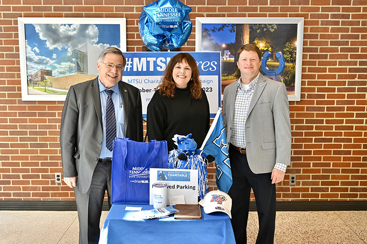 From left, John Vile, dean of University Honors College, joins Amy Harris, associate dean in the College of Graduate Studies, and Mark Clark, executive director of development in the Development Office to conduct the final drawing for participant prizes for the 2023-24 Employee Charitable Giving Campaign in the atrium of the Cope Administration Building in early November. Middle Tennessee State University employees pledged a record $158,278, easily surpassing the goal of $147,500. (MTSU photo by James Cessna)