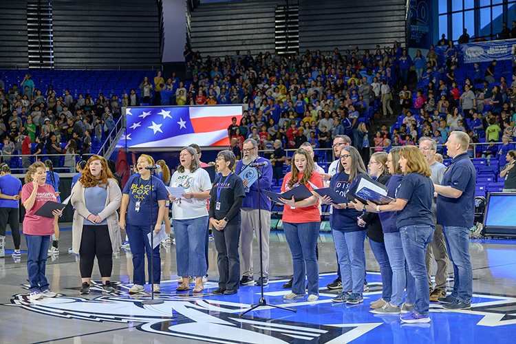 Murfreesboro City Schools music teachers sing the national anthem Nov. 9, 2023, during the 10th annual Education Day game between the Middle Tennessee State University women’s basketball team and the Florida A&M Rattlers inside Murphy Center. The game brings thousands of MCS fourth through sixth graders to campus. (MTSU photo by J. Intintoli)