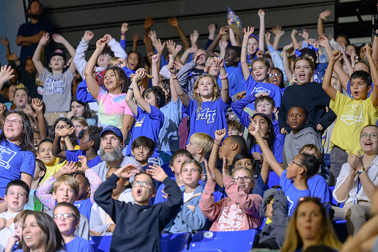 Murfreesboro City Schools students join together in cheering on the Lady Raiders women’s basketball team Nov. 9, 2023, during the 10th annual Education Day game inside Murphy Center on the campus of Middle Tennessee State University. (MTSU photo by J. Intintoli)