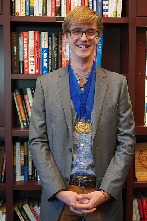 Middle Tennessee State University Honors student Eli Ward is all smiles after defending his Honors thesis in early November 2023. (Photo by Connie Bartemus)