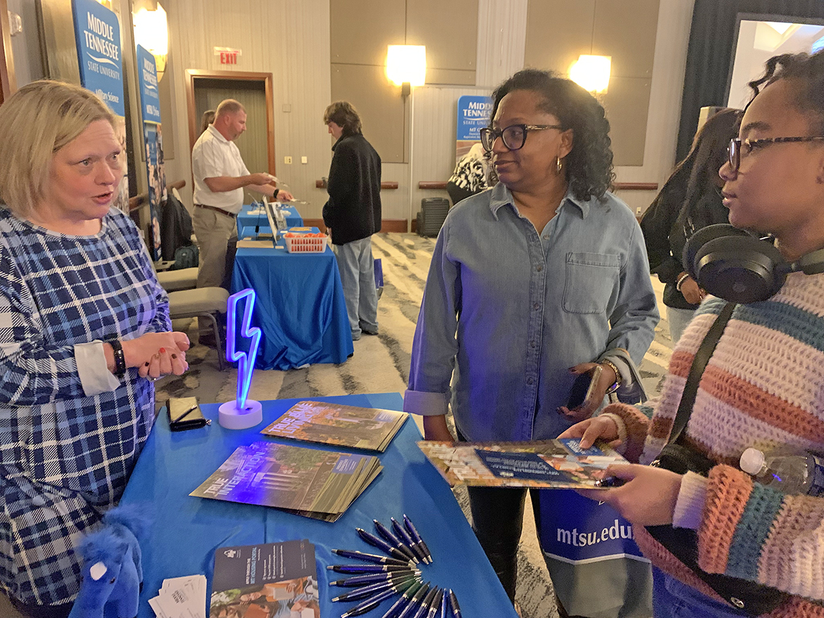 Michelle Safewright, left, Middle Tennessee State University Housing and Residential Life director, answers questions from Journey Allen, right, a Hixson High School senior, and her mother, Courtney Allen, during the Nov. 2 MTSU True Blue Tour recruiting event at The Chattanoogan Hotel in Chattanooga, Tenn. MTSU Admissions, Military Science, financial aid and more than 20 campus departments were available to meet with prospective students and their parents. (MTSU photo by Randy Weiler)
