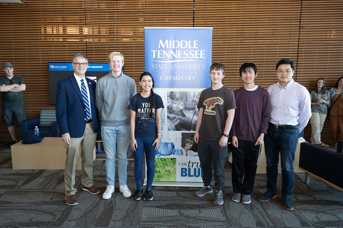 Middle Tennessee State University College of Basic and Applied Sciences Dean Greg Van Patten, left, and Chemistry Department associate professor and tournament director Mengliang “Mike” Zhang, right, are shown with winners and top finishers in the Chemistry Scholarship Tournament, held in the MTSU Science Building in early November. Page High School’s Evan Ingmire, second from left, placed second behind overall winner Sophie McAtee of Ravenwood High, while Jackson Stinson of Summit High finished third and Brayden Zhang, no relation to the event director, earned top junior honors. Stinson was the top junior in 2022. (MTSU photo by James Cessna)