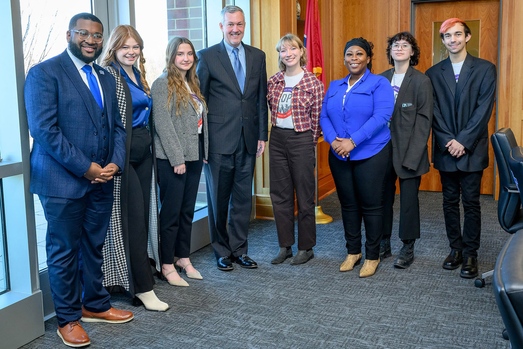 Secretary of State Tre Hargett visited the Middle Tennessee State University campus Nov. 28, 2023, for a luncheon where he presented the Student Government Association and MTSU chapter of the American Democracy Project members with the Tennessee College Voter Registration Award in the four-year public school category. Pictured, from left, are Michai Mosby, SGA president; Caroline Spann, SGA election commissioner; Victoria Grigsby, ADP president; Secretary of State Tre Hargett; Nancy Prescott, ADP graduate research assistant; Kalea Jackson, ADP vice president; Dante Buttrey, ADP treasurer; and Marcus Rosario, ADP member. (MTSU photo by J. Intintoli)