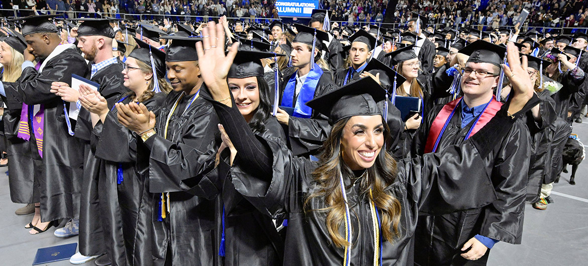 A member of Middle Tennessee State University’s Class of 2023 raises her hands in celebration after getting her diploma during the afternoon fall commencement ceremony. MTSU presented 1,761 undergrad and graduate degrees to students in two ceremonies held Dec. 16. (MTSU photo by Andy Heidt)