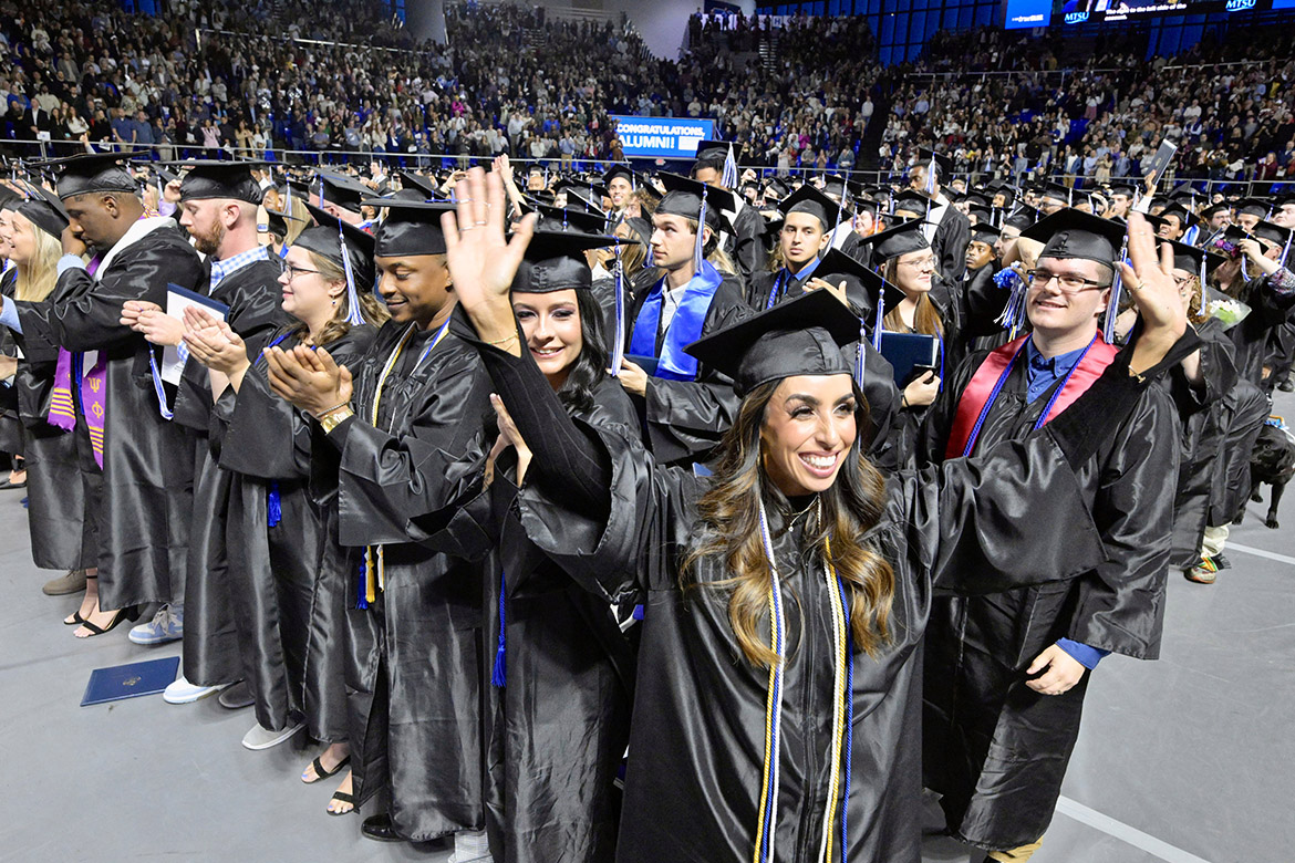 A member of Middle Tennessee State University’s Class of 2023 raises her hands in celebration after getting her diploma during the afternoon fall commencement ceremony. MTSU presented 1,761 undergrad and graduate degrees to students in two ceremonies held Dec. 16. (MTSU photo by Andy Heidt)