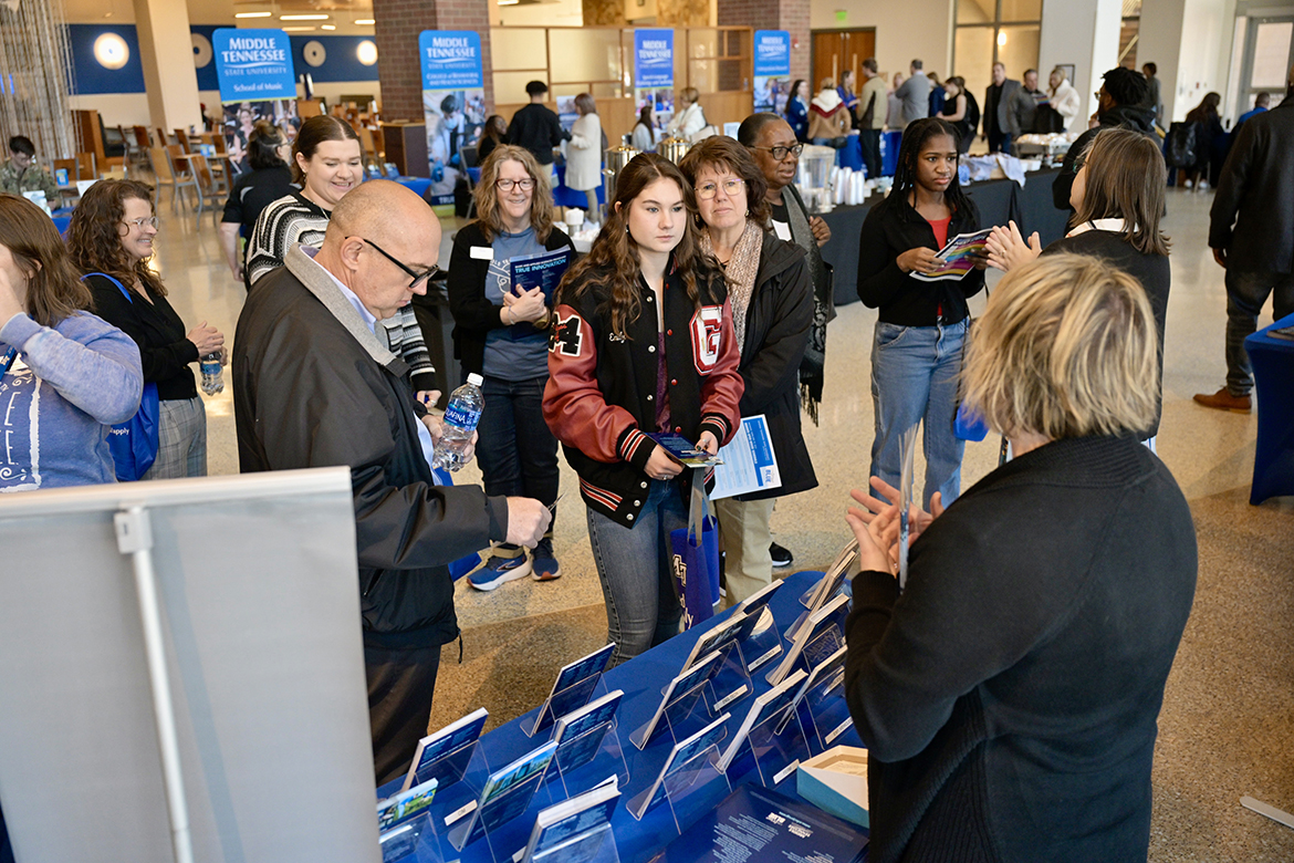 Advisors from various Middle Tennessee State University colleges answer questions posed by visitors attending the annual University Honors College Open House Monday, Feb. 19, in the Student Union Building’s first-floor atrium. Prospective students and their parents from across Tennessee and the region came to learn more about the Honors College. (MTSU photo by Andy Heidt)