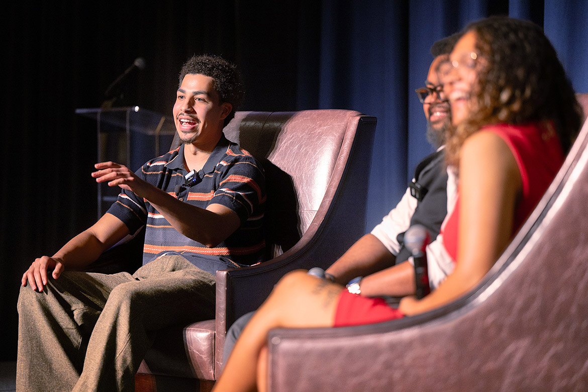 Middle Tennessee State University’s Black History Month keynote speaker Marcus Scribner, far left, best known as Andre “Junior” Johnson in the syndicated comedy series, “Black-ish,” is interviewed on stage Thursday, Feb. 22, by Human Development and Family Sciences major Jaliyah Webb, foreground, of Gallatin, Tenn., and School of Journalism and Strategic Media student Jayden Blair, center, from Nashville, Tenn. (MTSU photo by James Cessna)