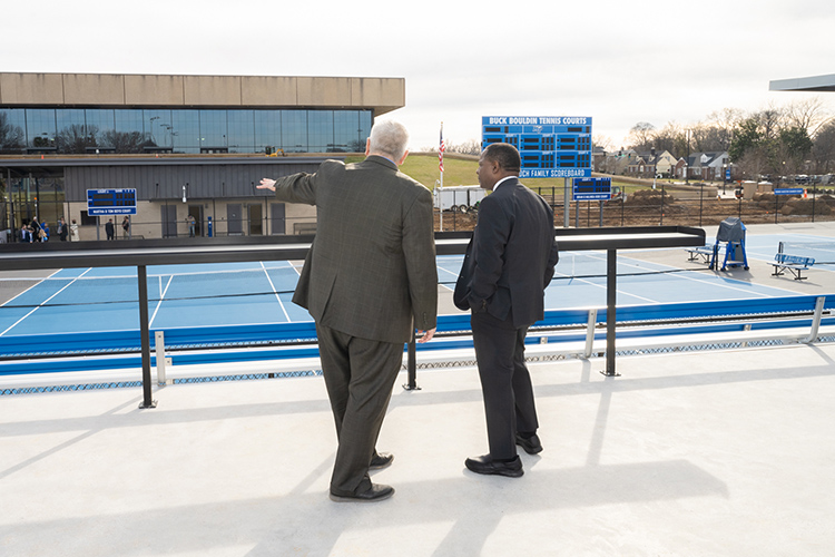 Middle Tennessee University Athletic Director Chris Massaro, left, and MTSU President Sidney A. McPhee look over the new courts of the new $8 million Outdoor Tennis Complex on the north side of Murphy Center following a ribbon-cutting ceremony Thursday, Feb. 1. (MTSU photo by James Cessna)